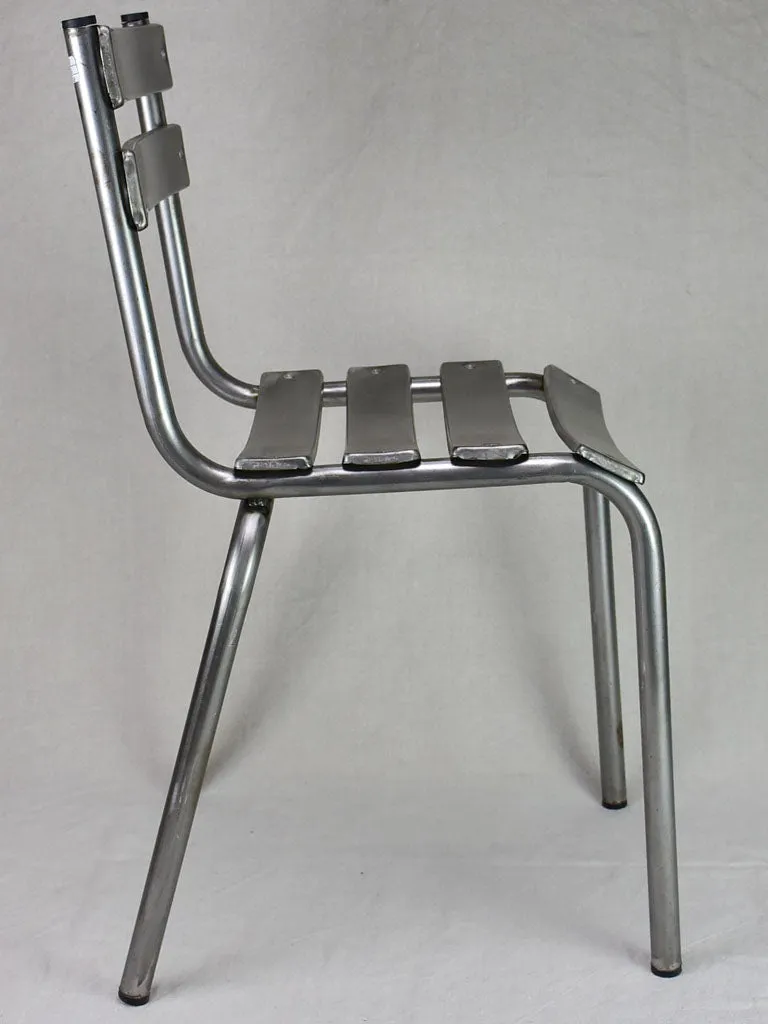 Pair of stackable mid century metal chairs (20 available)